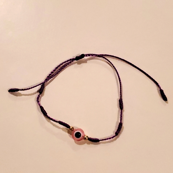 Jewelry - Pink Evil eye bracelet with purple string